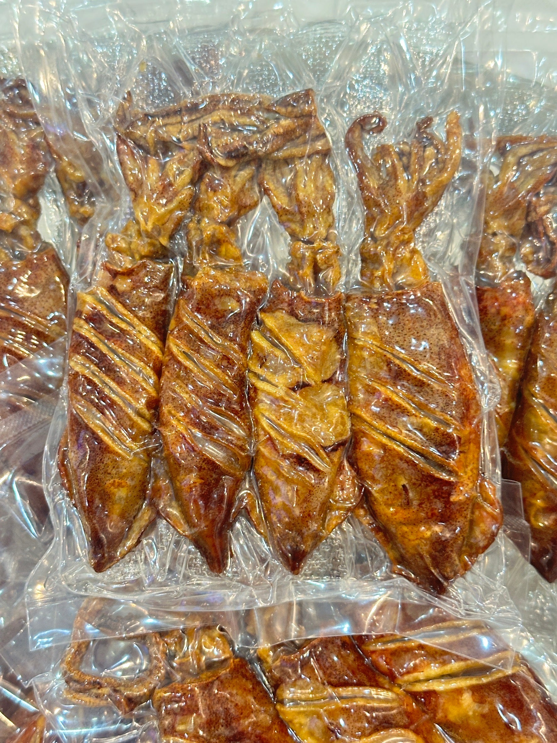 Crispy fried sun-dried squid with roe หมึกแพไข่ทอด image 0